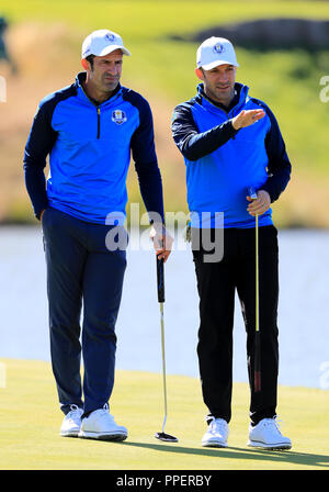 Team Europe's Alessandro Del Piero (right) and Luis Figo (left) during the 2018 Ryder Cup Celebrity Match at Le Golf National, Saint-Quentin-en-Yvelines, Paris. Stock Photo