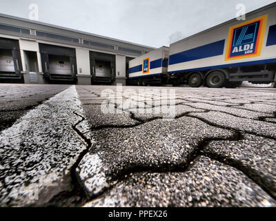 Truck in front of the logistics center of the retail chain Aldi in Eichenau. Stock Photo