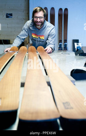 Carpenter Florian Schwarz manufactures designer skis from local wood in his ski factory 'Artisan Skis' in Hechendorf. Stock Photo