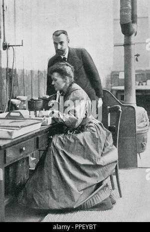 CURIE, Pierre (Paris, 1859-1906); Marie (Warsaw, 1867-Sallanches, 1934). French physicists. Discoverers of the radium in 1898. They received the Nobel Prize in Chemistry in 1903. Portrait of Pierre and Marie in the laboratory. YEAR 1904. Stock Photo