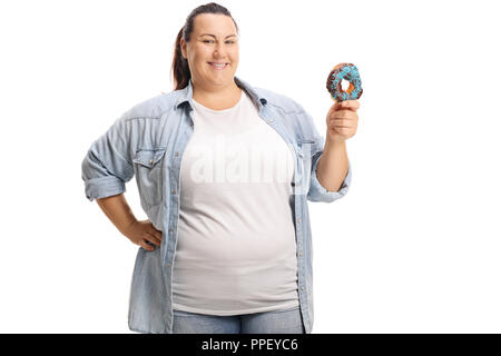 Smiling overweight woman holding a donut isolated on white background Stock Photo