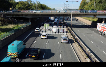 M60 motorway Whitefield interchange at junction 17 traffic driving under A56 road bridge in greater manchester uk Stock Photo