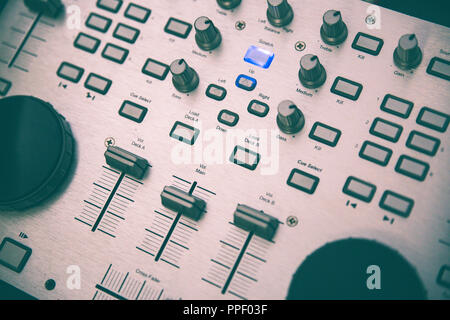 Detail of an audio control panel used by the DJ to mix live music Stock Photo