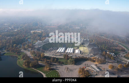 View of the Olympiastadion in the mist as seen from the Olympiaturm. Stock Photo