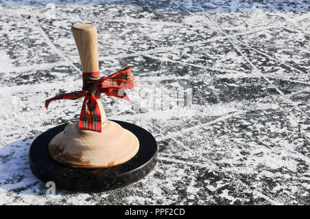 Curling on the Kleinhesseloher lake, Munich, Germany Stock Photo