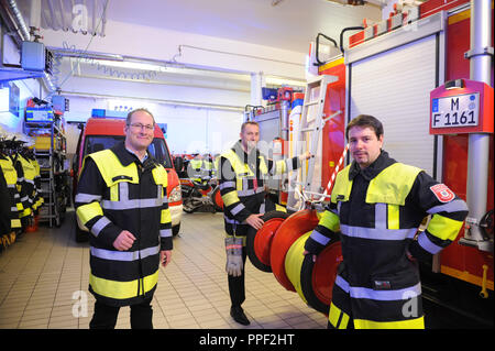 From left to right: Managing Director of volunteer firefighters Munich, Andreas Igl together with the Department Leaders of the Volunteer Fire Department Sebastian Meusel and Matthias Wolf in Sendling, Munich, Germany Stock Photo