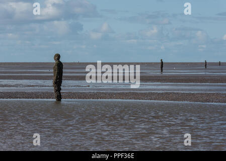 Sculptures by Antony Gormley on Crosby Beach near Liverpool, UK Stock Photo