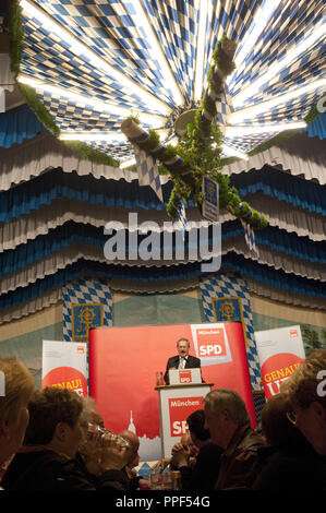 The Lord Mayor of Munich, Christian Ude, SPD candidate for the Bavarian state election, speaks at a campaign evening of his party at the Spring Festival in Zuericher Strasse. Stock Photo