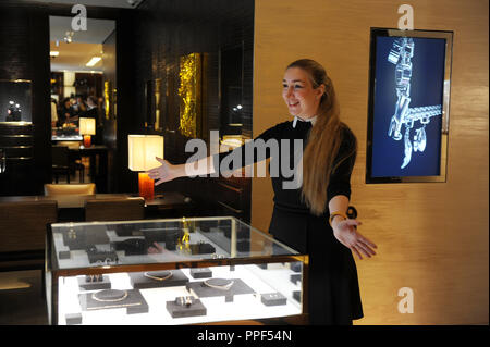 Opening of the Louis Vuitton store in the Residenzstrasse. A saleswoman advertises. Stock Photo