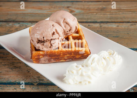 Ice cream waffle and whipped cream Stock Photo