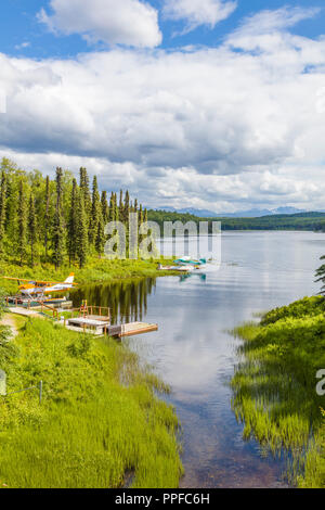 Seaplanes or floatplanes on small lake in Talkeetna Alaska Stock Photo