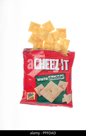 Cheez-It white cheddar cheese snack crackers packet with crackers spilling out Stock Photo