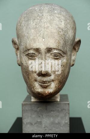 Head from a male statue. Limestone. Ptolemaic Period. 3rd century BC. Origin unknown. Ny Carlsberg Glyptotek. Copenhagen. Denmark. Stock Photo