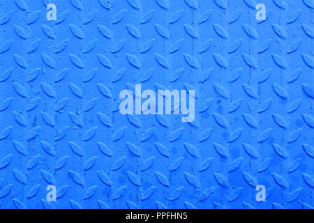 Corrugated metal sheet. Diamond-shaped riffles. Texture of old painted metal surface Stock Photo