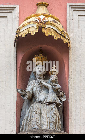 Sculpture of the virgin Mary with the baby Jesus under a canopy, patron saint at a town house, Bamberg, Upper Franconia, Bavaria Stock Photo