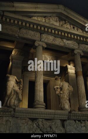 Neried Monument. Sculptured tomb from Xanthos. Classical Period Lycia. Kinik, Antalya province, Turkey.  Built 4th century BC. Tomb for Arbinas. Reconstructed facade of the monument. British Museum. London. Stock Photo