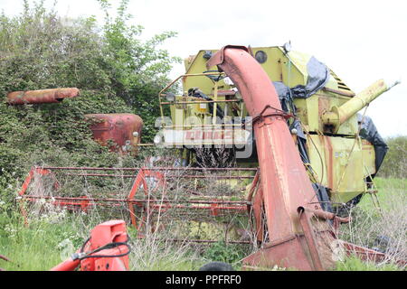 Abandoned farm machinery in France Stock Photo