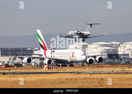 Frankfurt / Main Airport, FRA, Fraport, Emirates Airbus A380-800, Private jet approaching, Bombardier CL-600-2B16 Challenger 605, Stock Photo