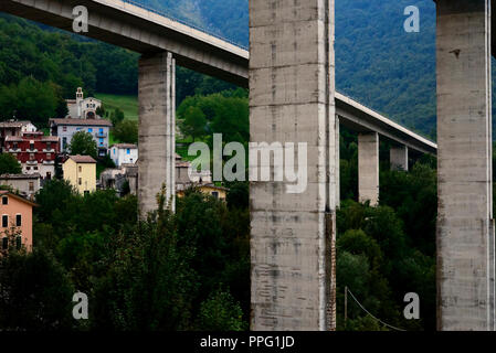 Highway bridge over ancient village Stock Photo