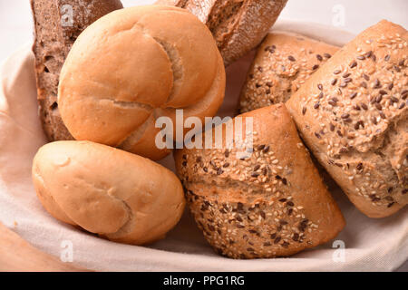 Different types of bread on a bread basket. Top view. Horizontal composition Stock Photo