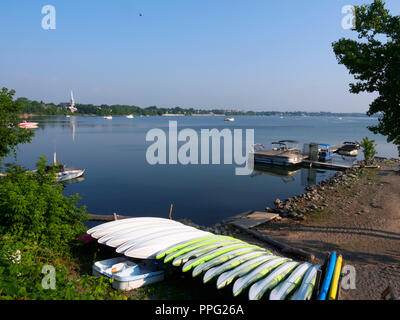 Moored boats and kayaks in Chambly Basin, Chambly, Quebec Stock Photo