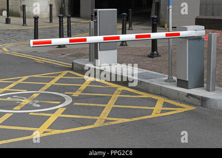 Rising arm access barrier at car park Stock Photo