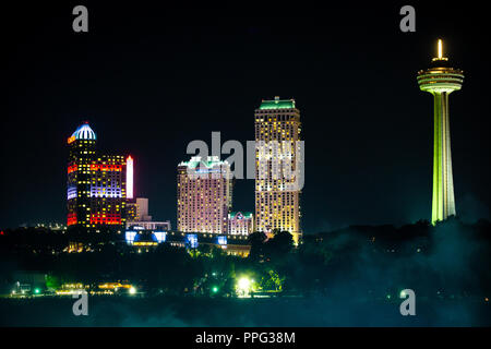 View on the Canadian side of the Niagara falls at night with tower Stock Photo