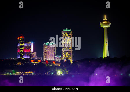 View on the Canadian side of the Niagara falls at night with tower Stock Photo