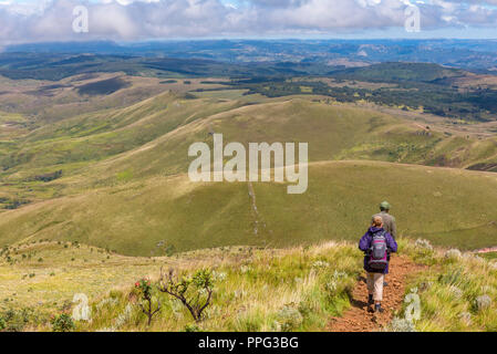 A hikers climbs the slopes of Mt Inyangani in Zimbabwe's Rhodes Nyanga ...