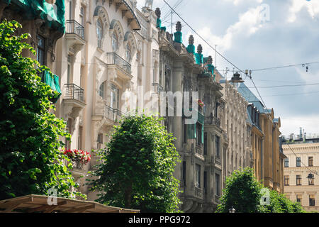 View of a row of Jugendstil style buildings (both renovated and unrenovated) on the north side of Alberta Iela in the Art Nouveau district of Riga. Stock Photo