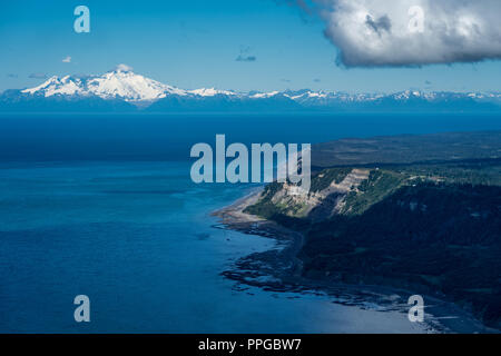 Aerial photography view of Alaska's Cook Inlet with a clear view of Mount Redoubt in Homer Alaska Stock Photo