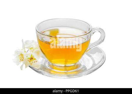 Transparent glass cup of green tea with jasmine flowers isolated on white background Stock Photo