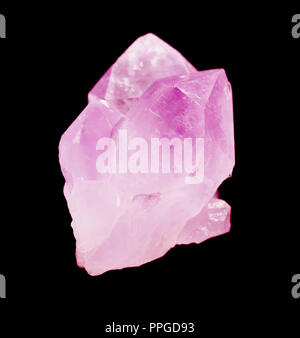 Several crystals of translucent pink quartz isolated on a black background Stock Photo