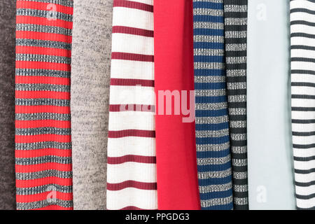 Samples of fabric -  knitted of different colors on the display case Stock Photo