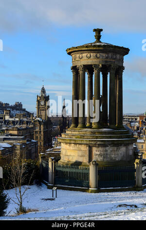 Dugald Stewart Monument, Balmoral Hotel clocktower and city skyline from Calton Hill, Edinburgh, Scotland Stock Photo