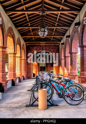 Student bicycles parked in the Southwest Loggia of Flagler College in St. Augustine Stock Photo