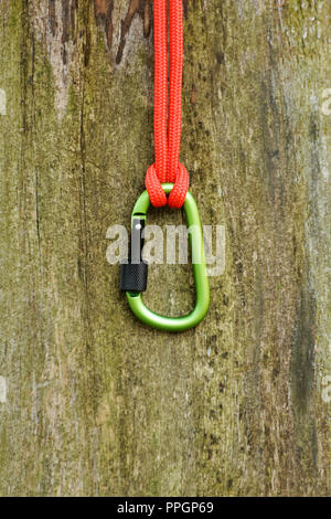 Metal carabine for mountaineering. Photo of colored carabines. Climbing concept Stock Photo