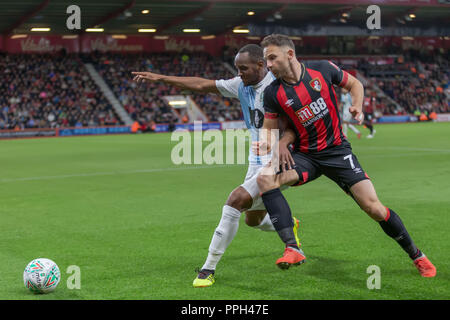 Marc Pugh of Bournemouth  and Ryan Nyambe of Blackburn Rovers compete for the ball during the EFL Carabao Cup 3rd round match between AFC Bournemouth and Blackburn Rovers at the Vitality Stadium, Bournemouth, England on 25 September 2018. Photo by Simon Carlton.  Editorial use only, license required for commercial use. No use in betting, games or a single club/league/player publications. Stock Photo