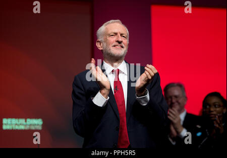 Liverpool, UK. 26th September 2018. Jeremy Corbyn, Leader of the Opposition, Leader of the Labour Party and Labour MP for Islington North, claps at the Labour Party Conference in Liverpool. © Russell Hart/Alamy Live News. Stock Photo