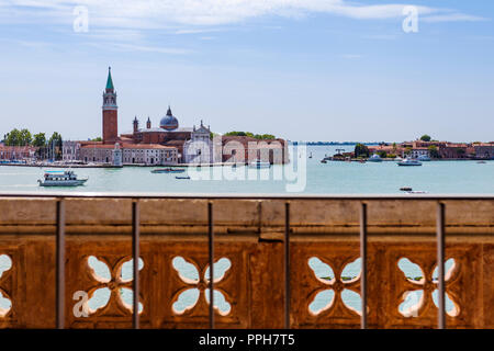 View of San Giorgio Maggiore 16th century Benedictine church designed by Palladio, landmark and tourist attraction in Venice seen from Doges Palace Stock Photo