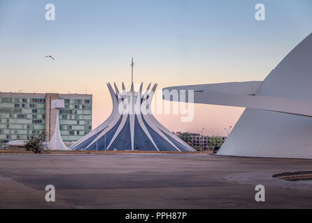 Brasilia Cathedral and National Museum at sunset - Brasilia, Brazil Stock Photo