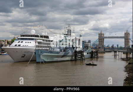 silver sea cruises cruise liner silver sea alongside on the river thames in central london next to hms belfast. Stock Photo