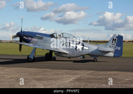 'Miss Helen', a historic preserved P-51D Mustang taxing in at the Imperial War Museum at Duxford, Cambridgeshire following a air display. Stock Photo