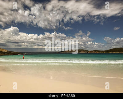 Esperance, Australia -- February 9, 2018. Lone woman in the water in Esperance, Australia Stock Photo