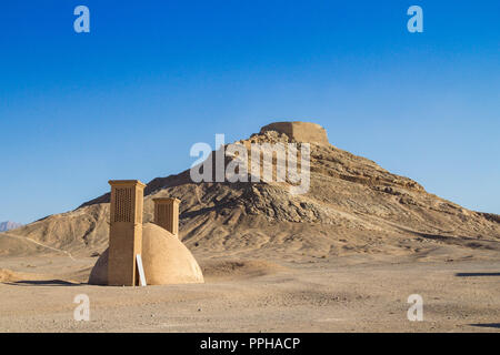 Towers of Silence in Yazd, Iran, in the middle of the desert. Also known as Dakhma, These towers were used in the Zoroastrian religion to dispose of t Stock Photo