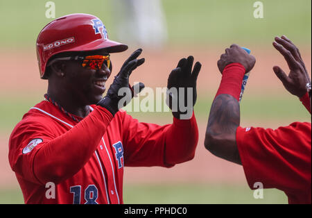 Rusney Castillo de Puerto Rico celebra carrera, durante el partido de beisbol de la Serie del Caribe entre Republica Dominicana vs Puerto Rico en el N Stock Photo