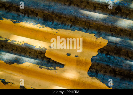 Yellow, green old retro grungy peeled wall texture, background Stock Photo