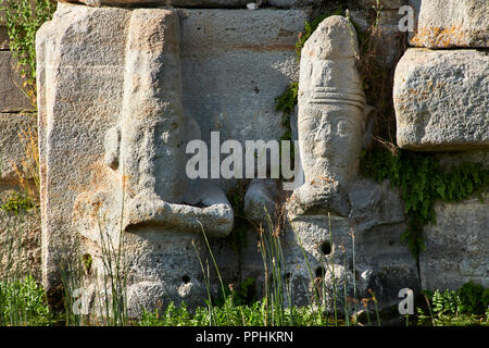 Close up of lower relief sculptures of Hittite gods at Eflatun Pınar ( Eflatunpınar) Ancient Hittite relief sculpture monument and sacred pool.  Betwe Stock Photo