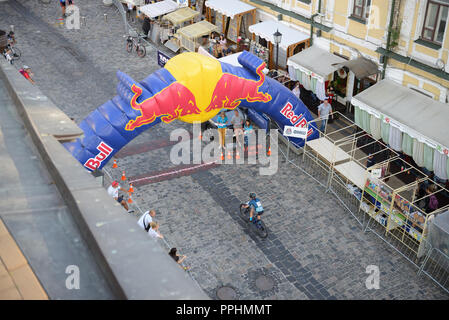 KYIV, UKRAINE - SEPTEMBER 22: The racers are on Red Bull Hill Chasers on September 22, 2018 in Kyiv, Ukraine. It is the uphill bike sprint race. Takin Stock Photo