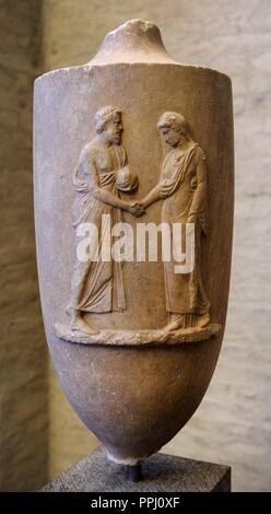 Greek Art. Munich Lekythos. Grave monument in the form of an oil flask (lekythos). About 370 BC. As a sing of their attachment the couple reach out their hands to each other. Gyptothek. Munich. Germany. Stock Photo